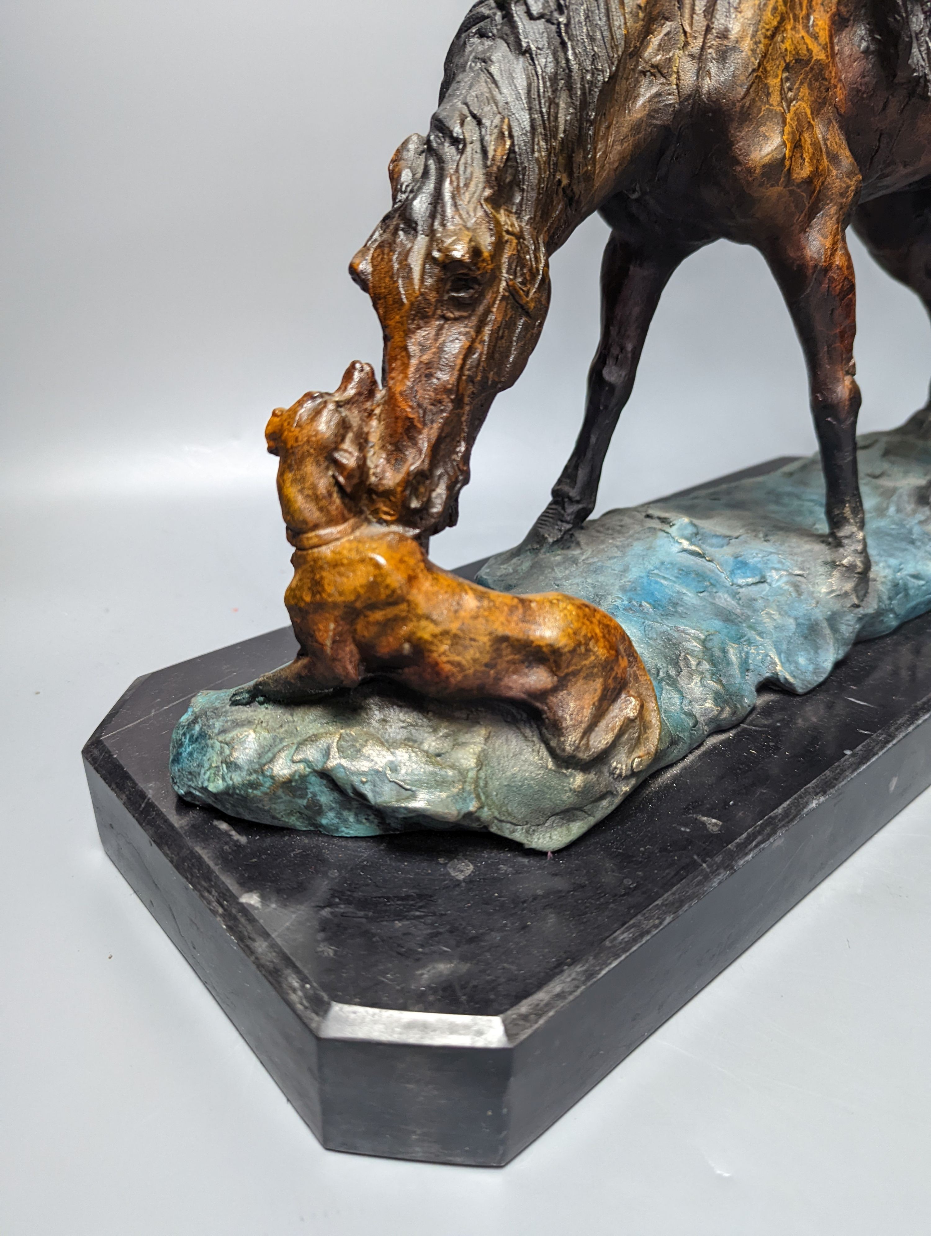 A contemporary cold-painted metal horse on marble base 43cm